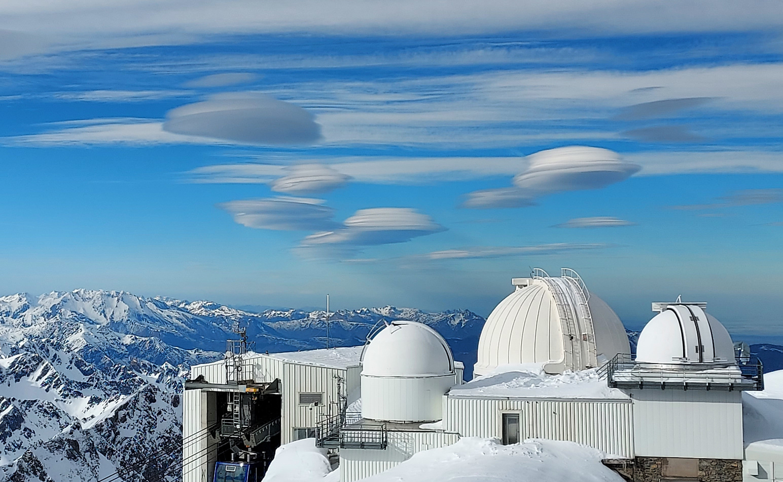 Photograph of clouds over Pic du Midi Observatory, cropped